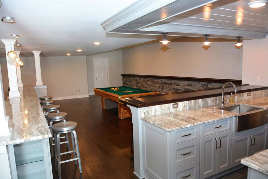 Finished basement bar and pool table