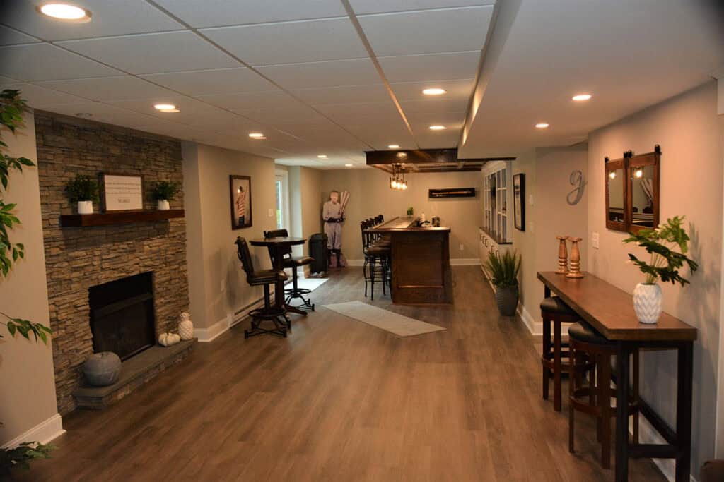 Finished basement bar and fireplace